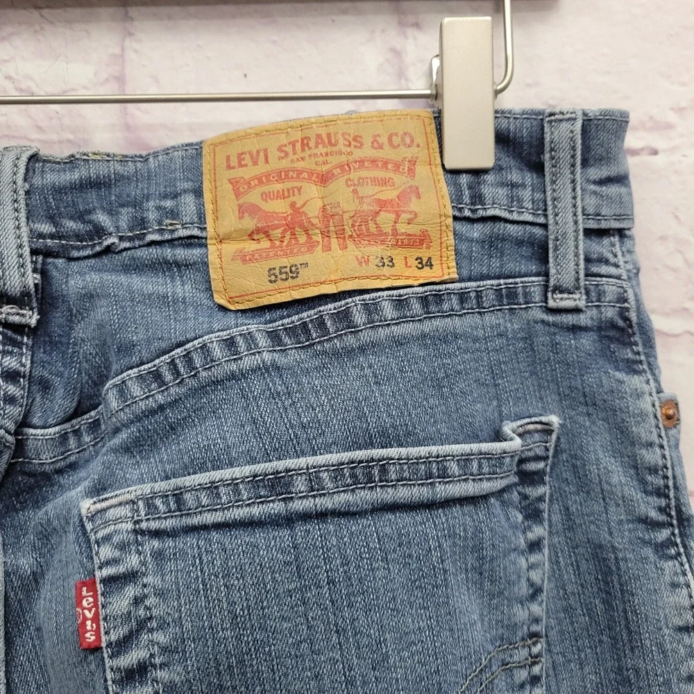 Levi's 559 Relaxed Straight Jeans 33x34 Blue Denim Distressed Baggy‎ Workwear